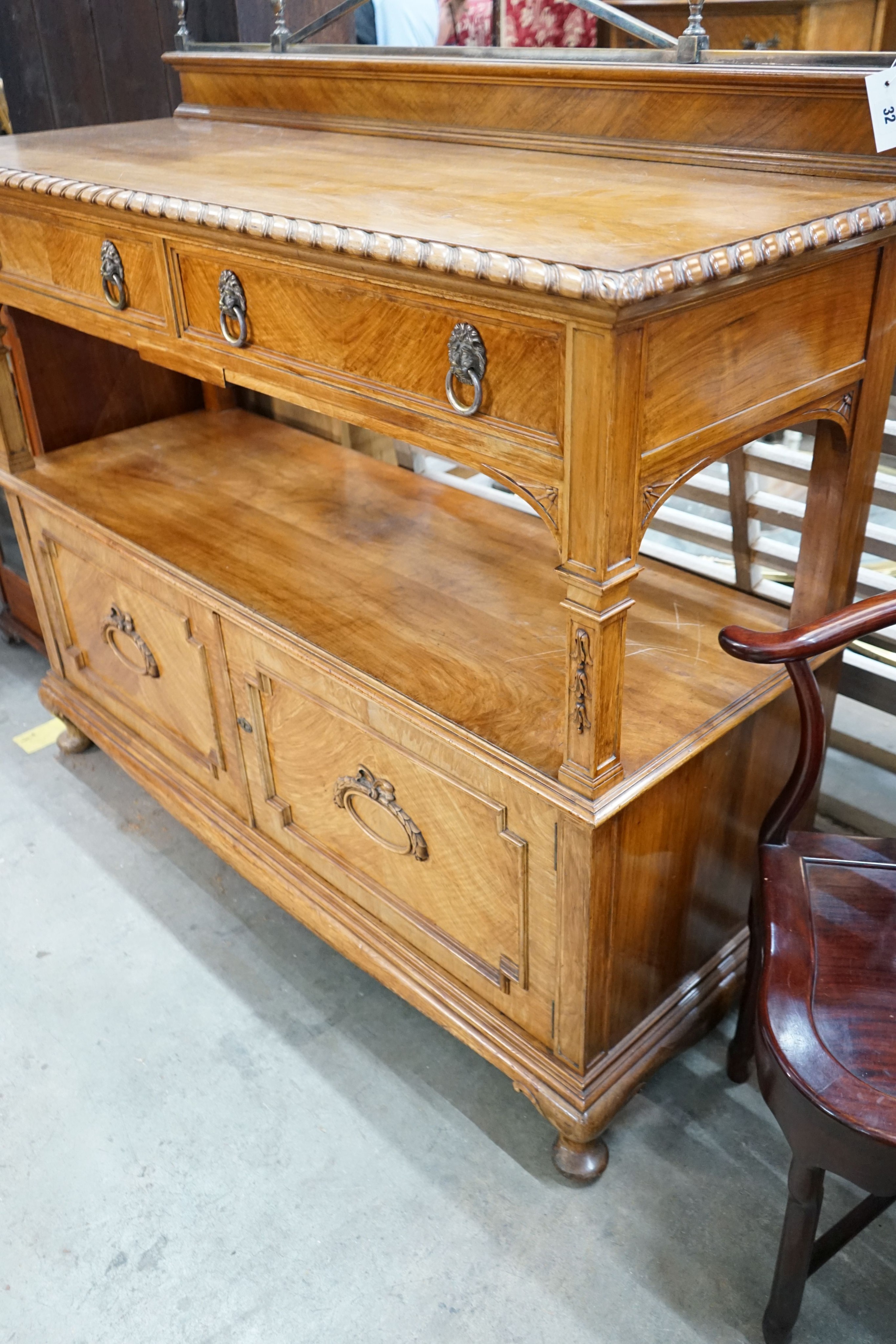 An early 20th century walnut buffet, length 144cm, depth 55cm, height 158cm